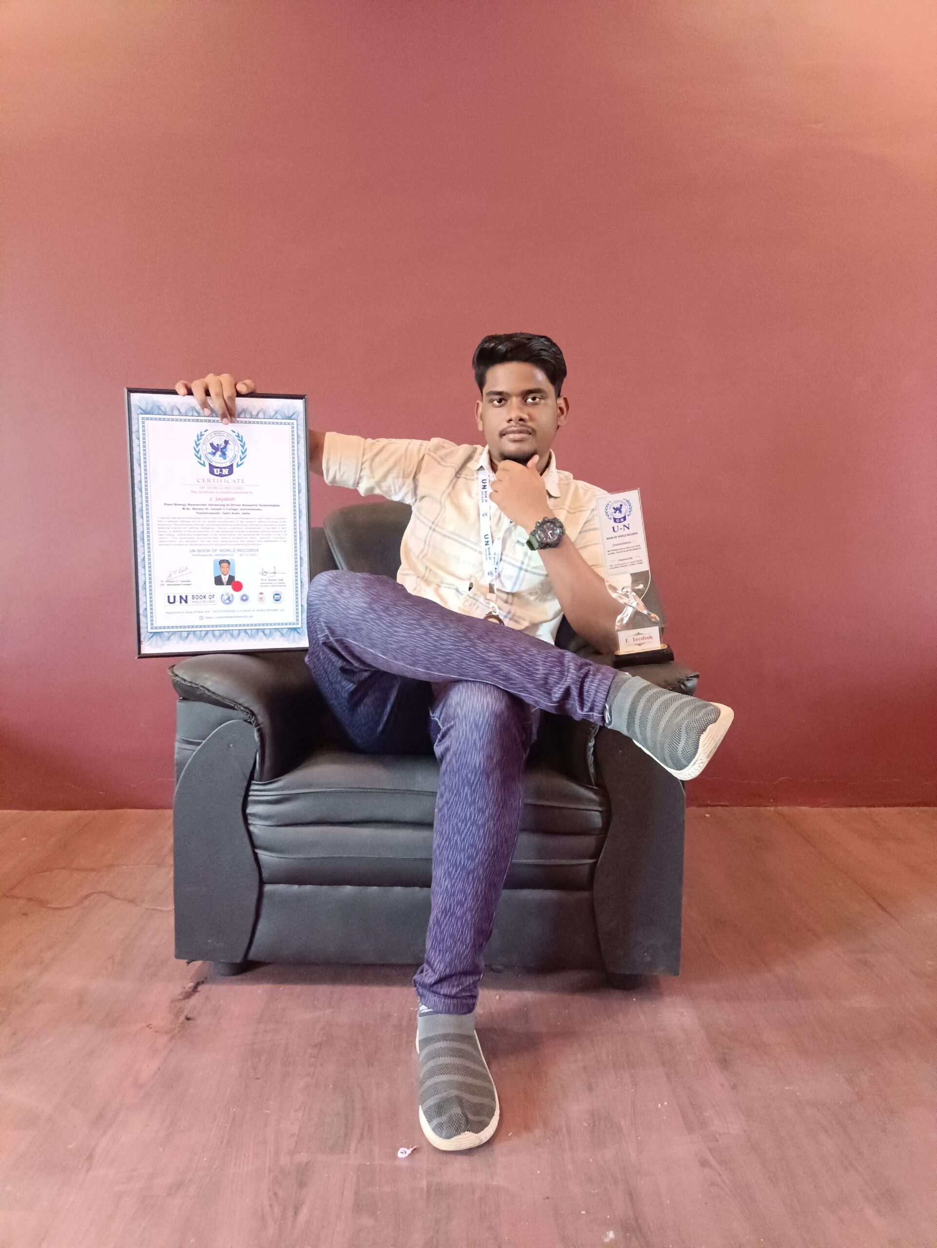 Jaydish J with certificate and award