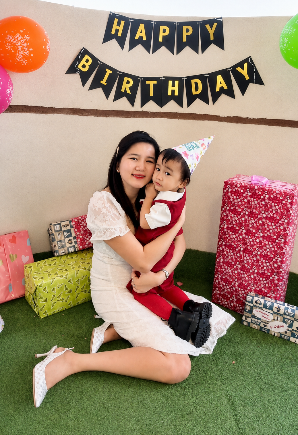 Joan Marie Gonzales with her son Hero on his birthday